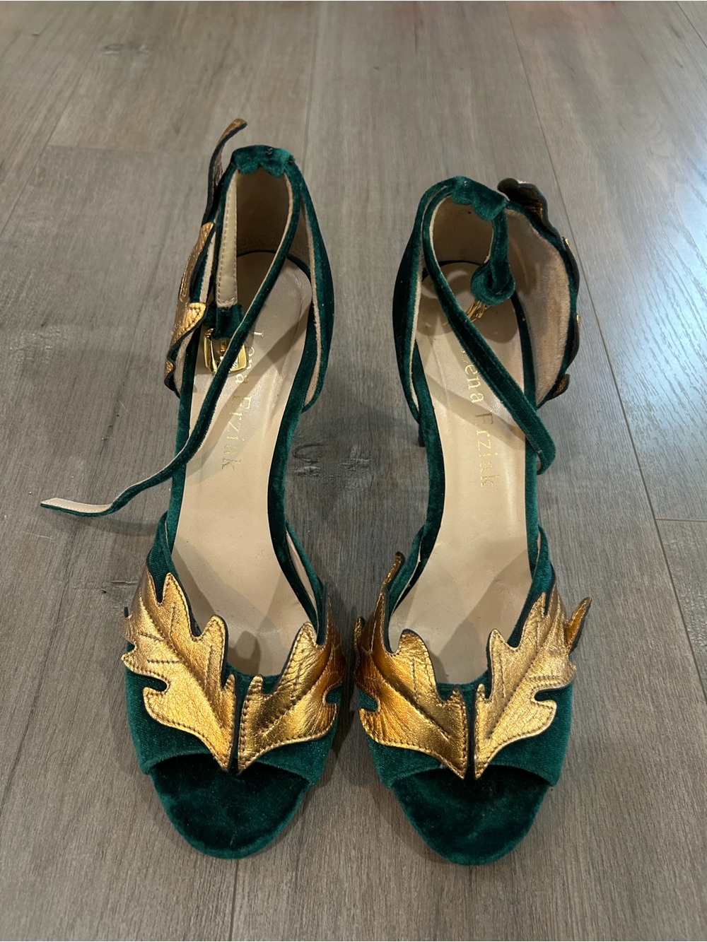 Lena Erziak
Size: EU 39
Green Velvet Ankle-Tie Heels with Gold Leaf Accent